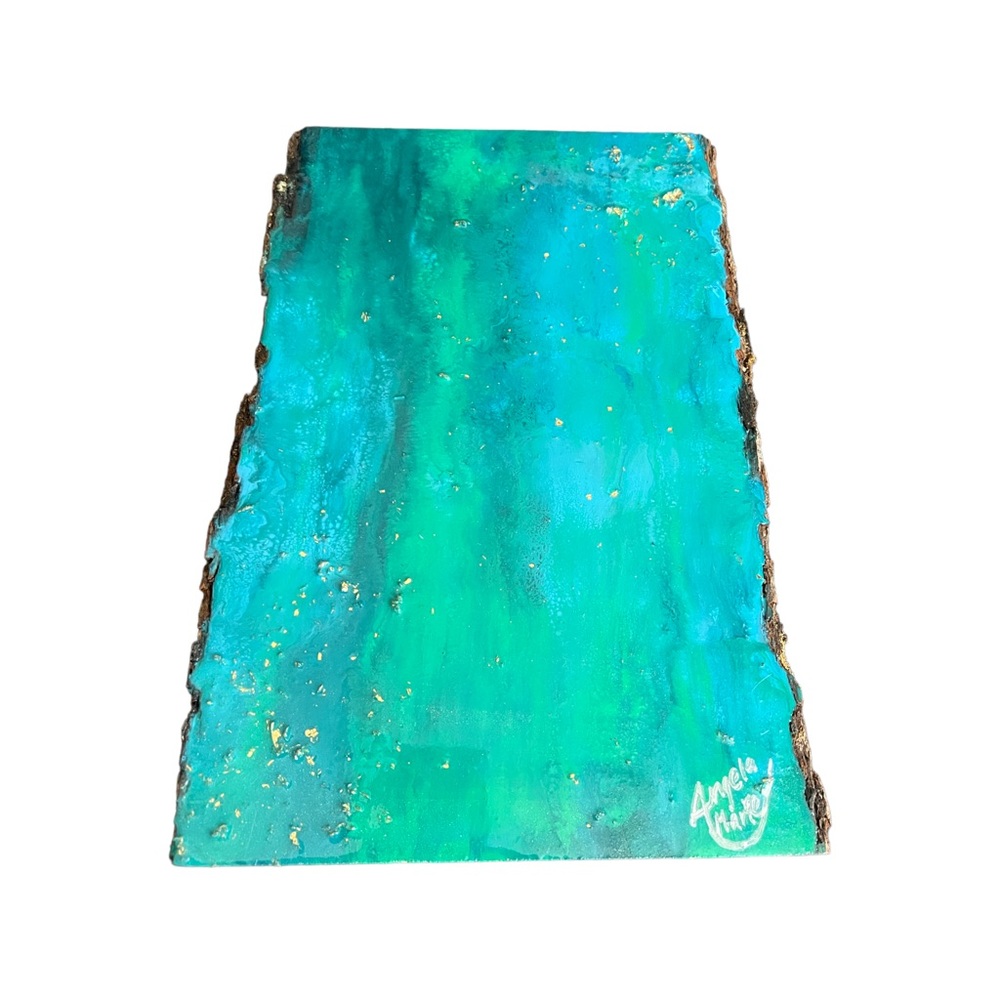 Resin artwork on live edge wood slice